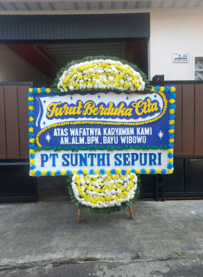 Papan Bunga Duka di Kakaskasen Tiga