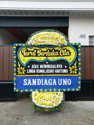 Papan Bunga Duka di Kakaskasen Tiga