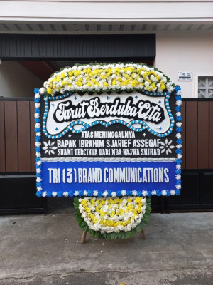 Papan Bunga Duka di Kakaskasen Tiga